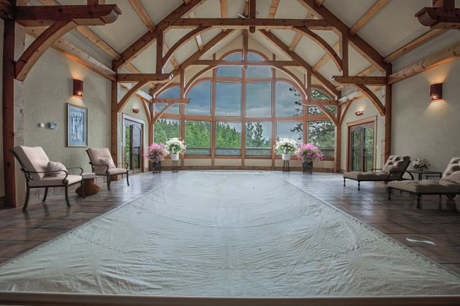 entrance to pool room off great room - digitally staged | Image 29