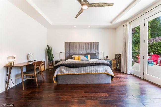 Double french doors to backyard, tray ceilings | Image 14