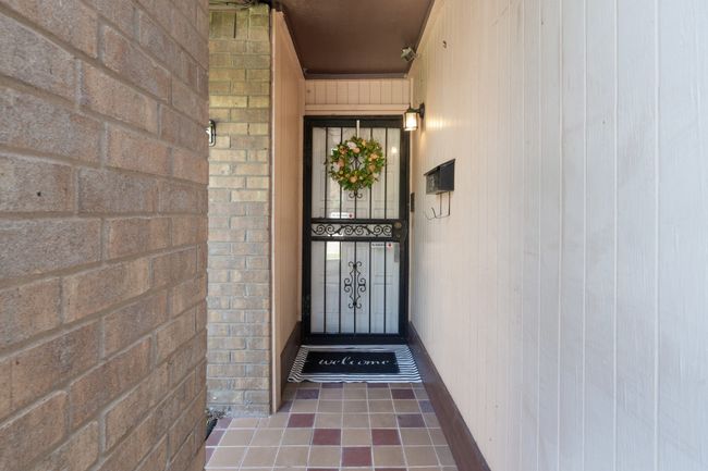 Inviting private and covered entry way. | Image 4