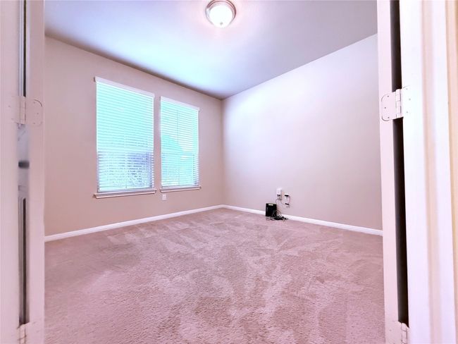 Carpeted spare room featuring baseboards | Image 10