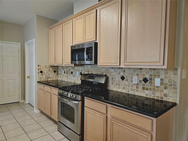 16515 Nightingale Falls Ct, House other with 4 bedrooms, 3 bathrooms and 2 parking in Cypress TX | Image 12