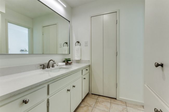 2nd vanity area with great storage area under vanity and separate linen closet as well as a 4th walk-in closet! | Image 23