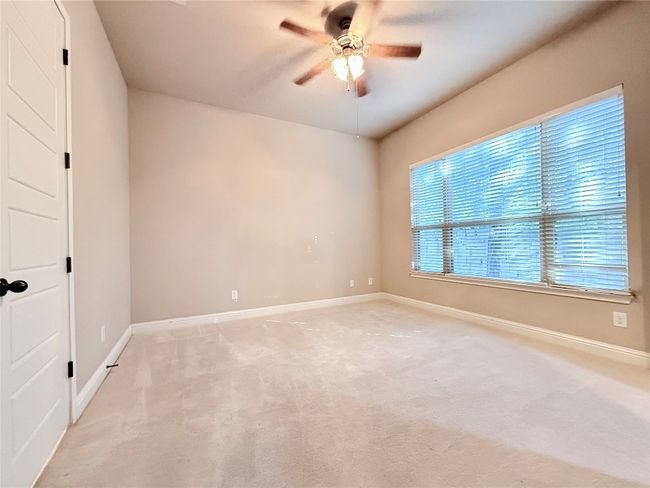 Unfurnished room with light carpet and ceiling fan | Image 28