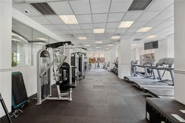 State-of-the-art fitness center with aerobics and weight room. | Image 14