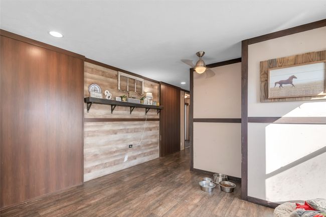 Corridor with recessed lighting and wood finished floors | Image 15