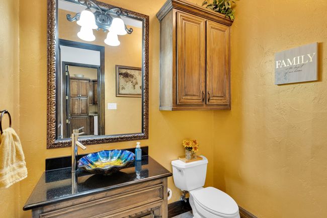 Half bath featuring custom sink | Image 26