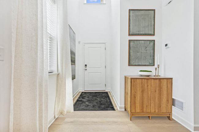 (Photo of decorated model, actual home's finishes will vary) The stunning foyer! | Image 9