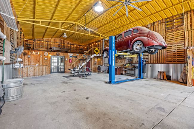 View of RV Parking and Shop with Car Lift and Large Loft | Image 30