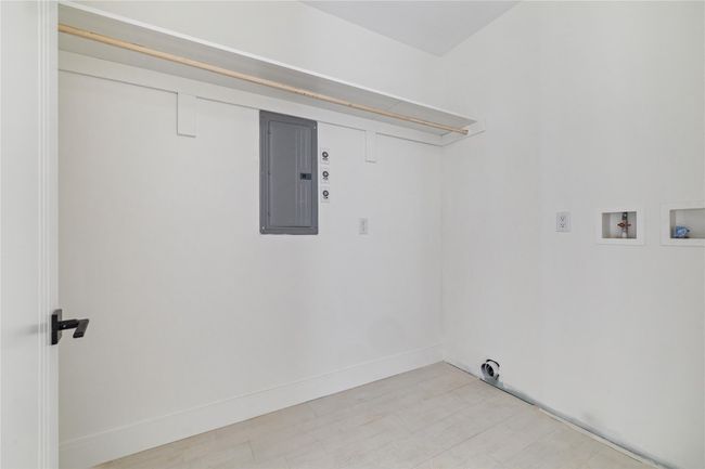 Laundry room with electric panel, electric dryer hookup, laundry area, and hookup for a washing machine | Image 25