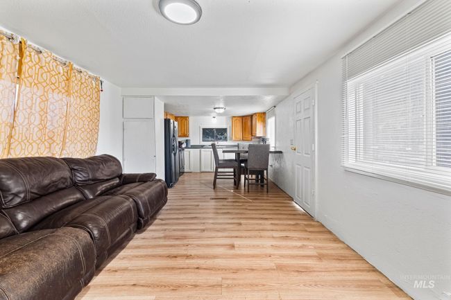 Living area featuring light wood-type flooring | Image 4