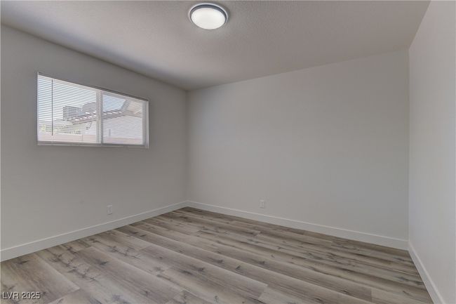 Spare room with light wood-style flooring and baseboards | Image 22