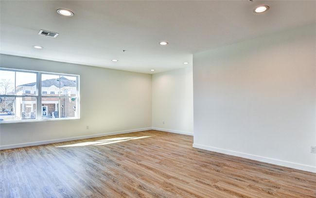 Unfurnished room with recessed lighting, visible vents, and light wood-type flooring | Image 30