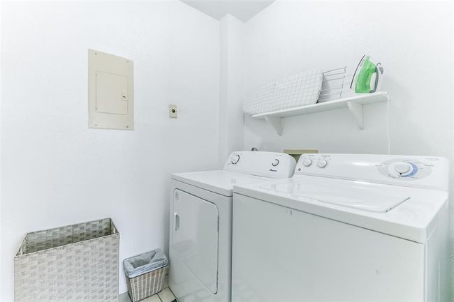 Talk about convenience, this unit has a full laundry room. | Image 18
