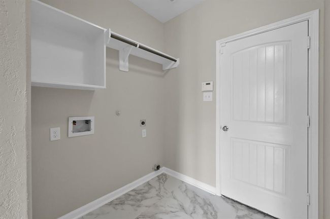 Utility room. Door is to the Garage. | Image 37