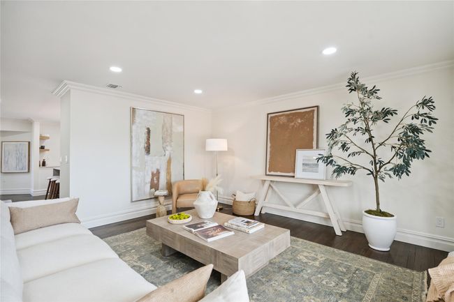 Living room featuring ornamental molding, wood finished floors, and recessed lighting | Image 13
