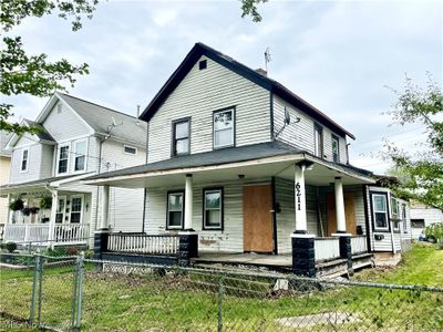 View of front of home featuring covered porch | Image 1