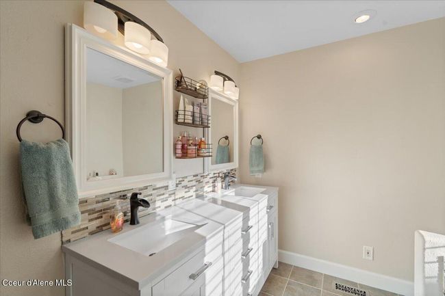 Upstairs primary bathroom with dual sinks | Image 18