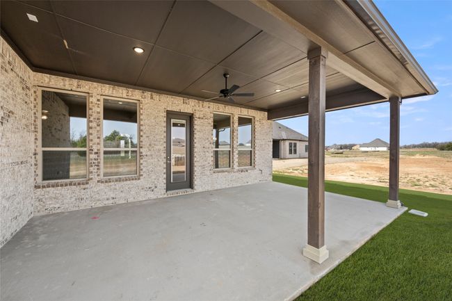 View of patio featuring ceiling fan | Image 25