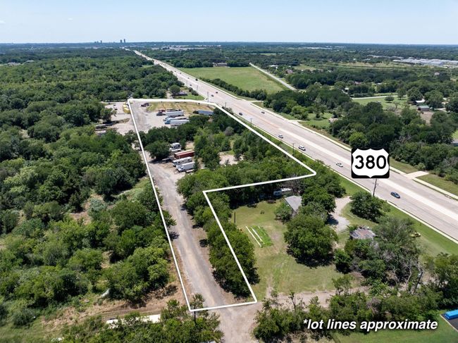 Aerial view of property and surrounding area featuring a highway and property boundaries highlighted | Image 4