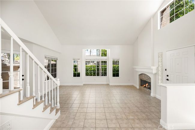 Spacious living area with fireplace | Image 4