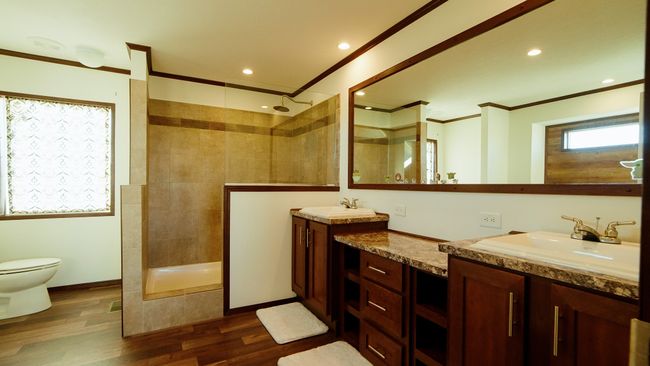 Full bathroom with wood finished floors, vanity, walk in shower, and ornamental molding | Image 27