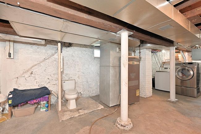 LOWER LEVEL LAUNDRY AND UTILITIES | Image 20