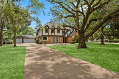 3 Car Garage*grass enhanced by photographer* | Image 1