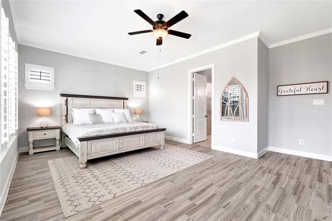 Upgraded flooring and extra extended primary bedroom | Image 26