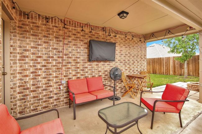 View of patio / terrace with an outdoor hangout area | Image 25