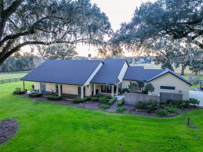 Set back along a long private drive sits the unquie farm residence | Image 4