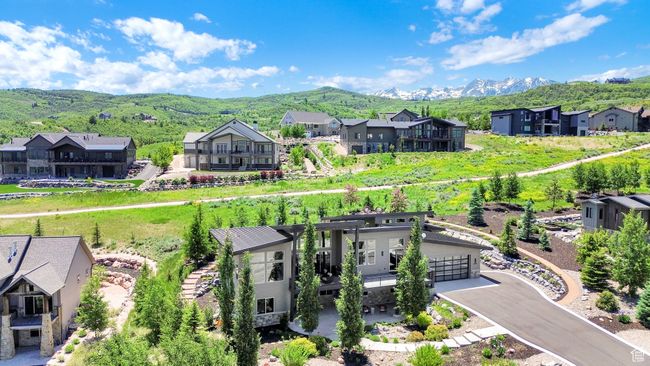 Aerial perspective of suburban area with a mountain backdrop | Image 104