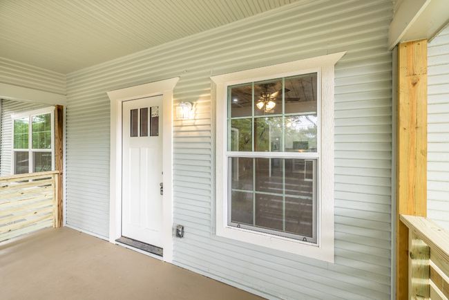 Entrance to property with covered porch | Image 25