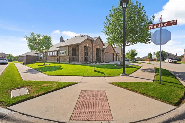 View of home's community featuring a lawn | Image 4