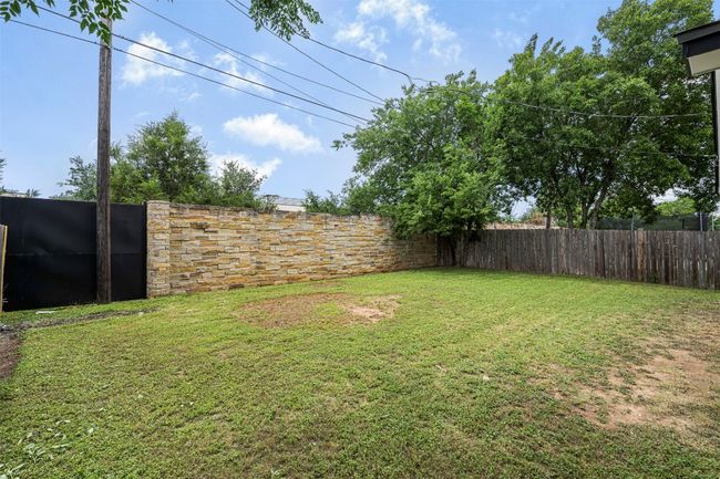 View of fenced backyard | Image 30