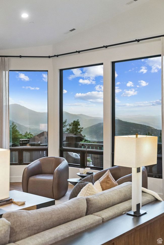Living room featuring a mountain view, wood finished floors, and recessed lighting | Image 21