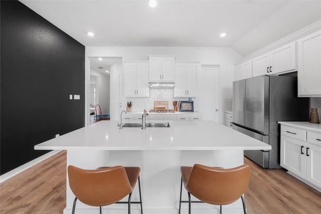 View of Kitchen and island | Image 6
