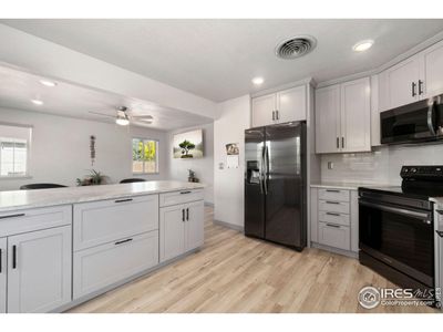 6196 Yates Ct, House other with 4 bedrooms, 2 bathrooms and null parking in Arvada CO | Image 2