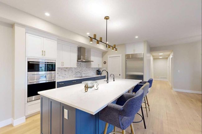 409 - 15 Cougar Ridge Landing Sw, Condo with 3 bedrooms, 3 bathrooms and 2 parking in Calgary AB | Image 4