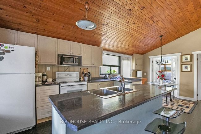 15 Cedar Nook Rd, House other with 3 bedrooms, 1 bathrooms and 10 parking in Coboconk ON | Image 7