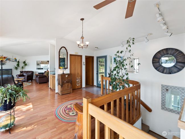 From entry, stairs to lower level. | Image 18