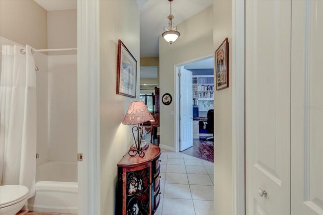 Front hallway looking in 2nd bathroom | Image 38