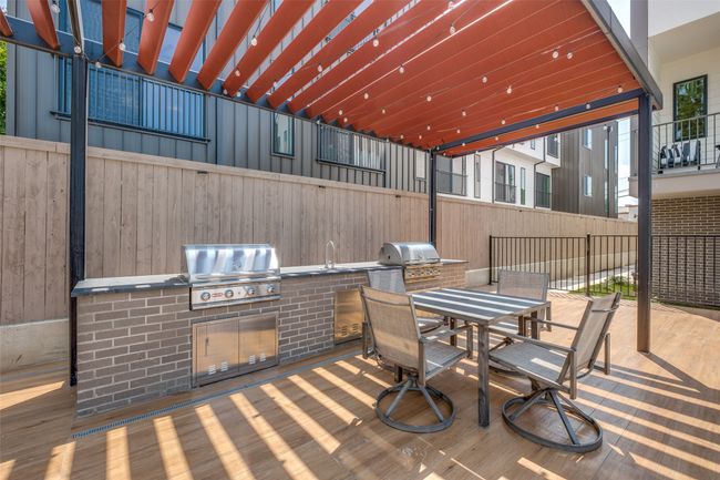 View of patio / terrace with outdoor dining space and a sink | Image 4