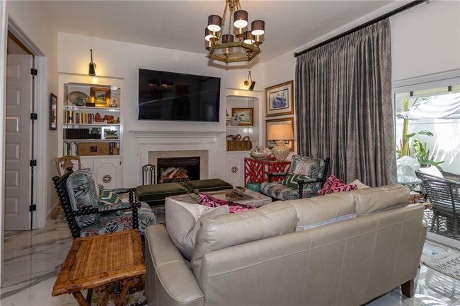Family room w/ wood burning fireplace | Image 17