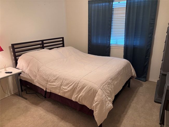 Bedroom with light carpet | Image 10