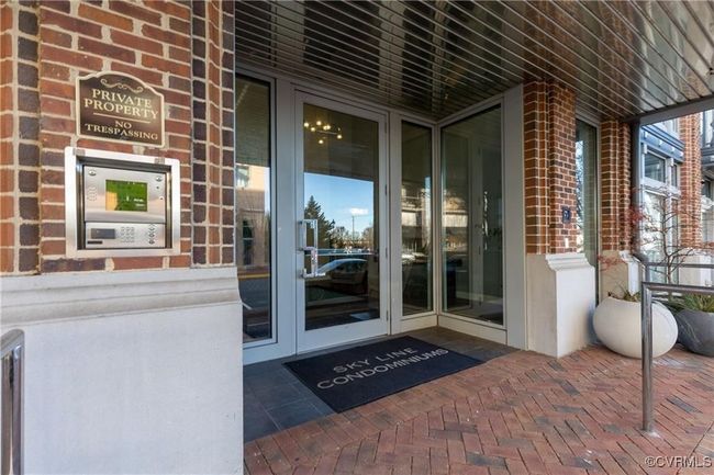 Property entrance with brick siding | Image 4
