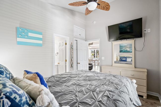 Bedroom with visible vents and wood finished​​‌​​​​‌​​‌‌​‌‌​​​‌‌​​‌‌​‌​​​​​‌ floors | Image 30