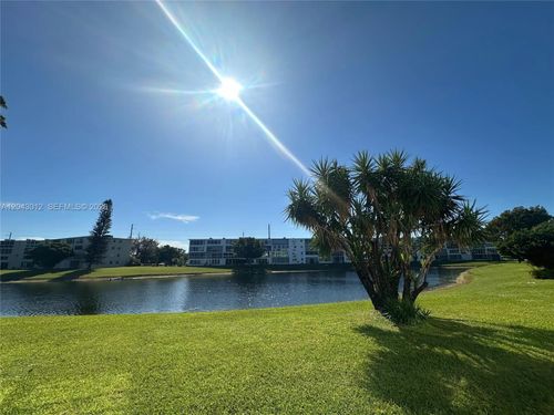 1009-1009 Harwood C, Deerfield Beach, FL, 33442-3427 | Card Image