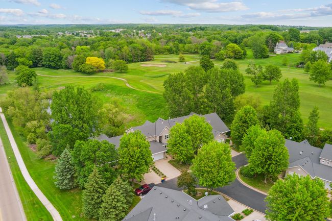 An unbeatable location—directly across from prestigious Shattuck-St. Mary’s School and backing to Legacy Golf Course! | Image 4