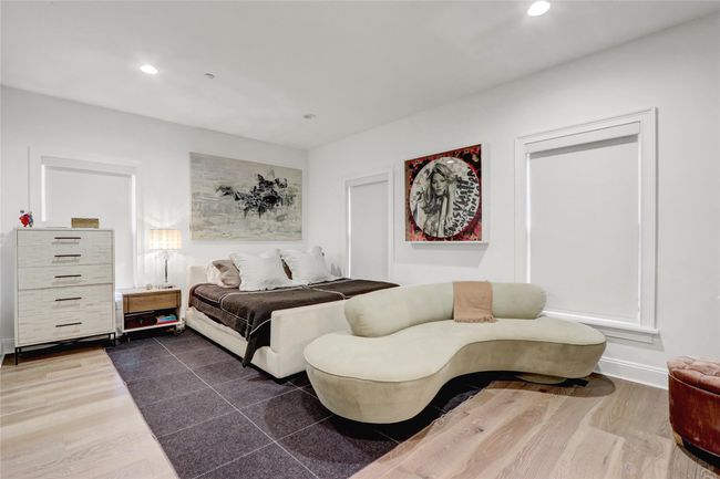Bedroom with dark wood-style flooring and recessed lighting | Image 13