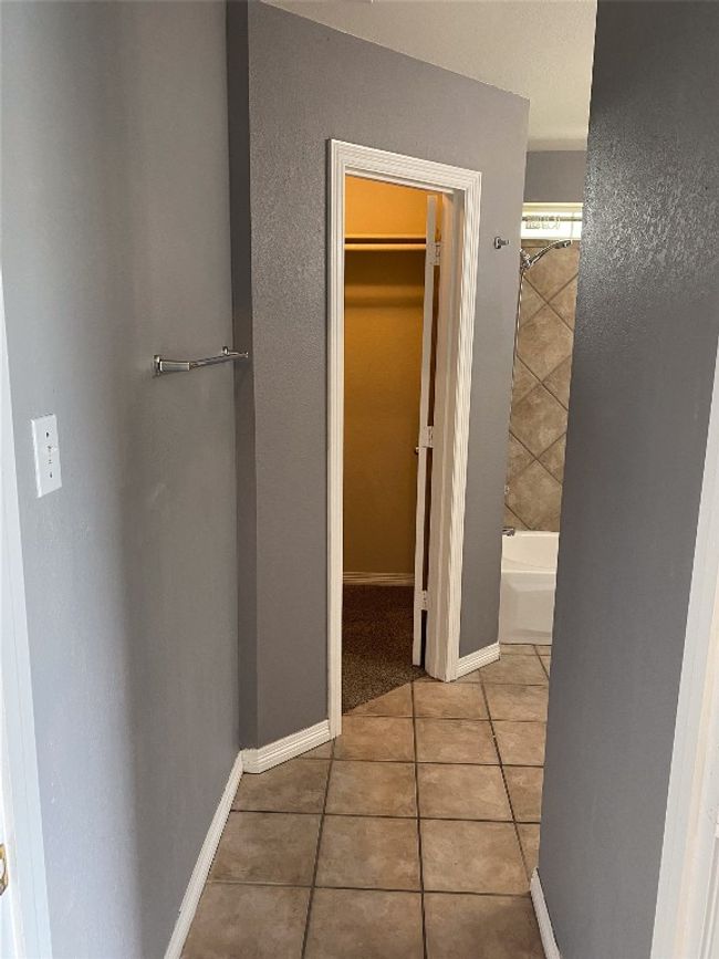Corridor with tile patterned floors | Image 21